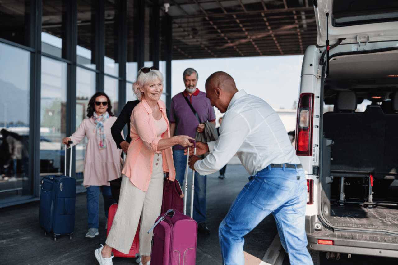 MexiRides driver helping with luggage at Puerto Vallarta airport